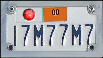 Car "smart license plate" with light bulb that gives information on the car
